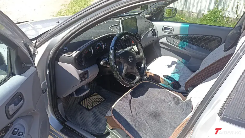 Nissan Almera, 2002
